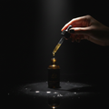 Rose Gold Oil dark studio spotlight